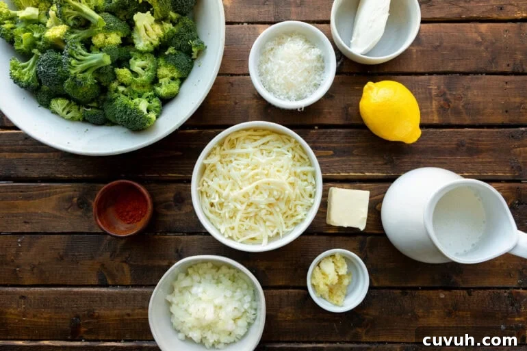 a photo of all the ingredients for creamy garlic parmesan broccoli in separate small bowls