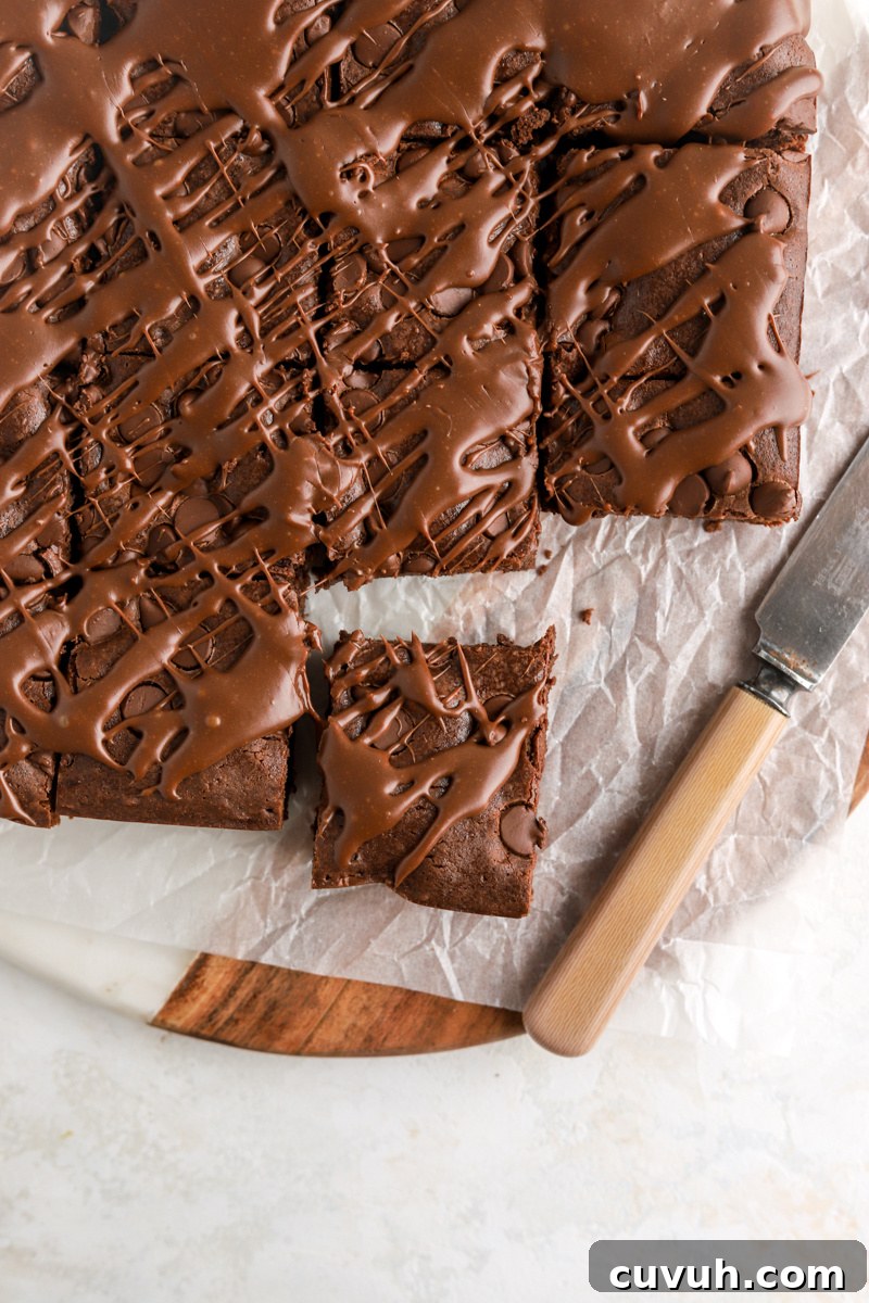 Cut brownies with chocolate sauce