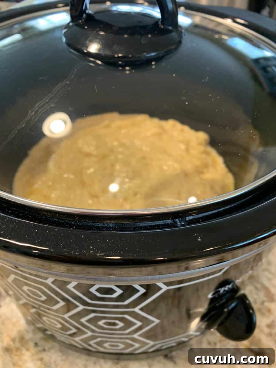 Banana bread dough baking in a Crockpot.