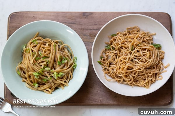 Two bowls of garlic noodles
