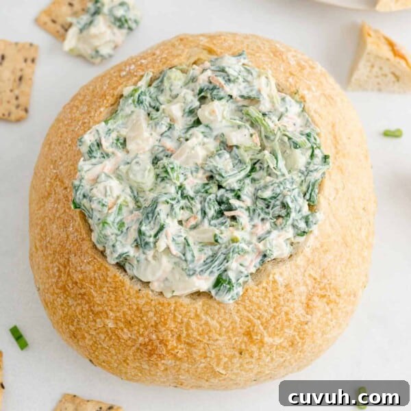 Spinach dip in a bread bowl.