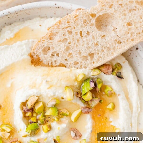 Whipped feta topped with honey and pistachio.