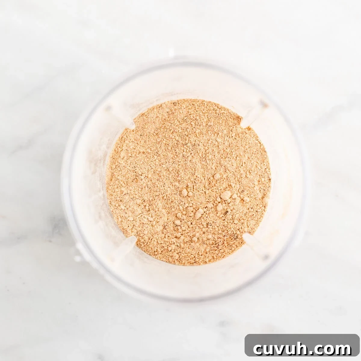 Vegan beef bouillon powder in a blender container.