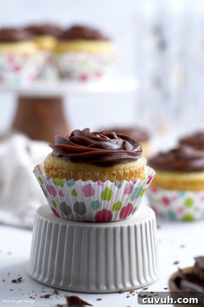 baileys cupcake sitting on an upside down ramekin