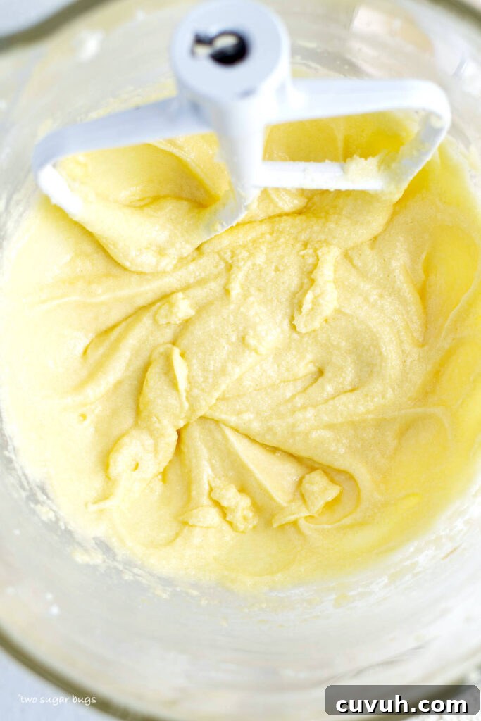 butter, sugar and eggs creamed in a mixing bowl